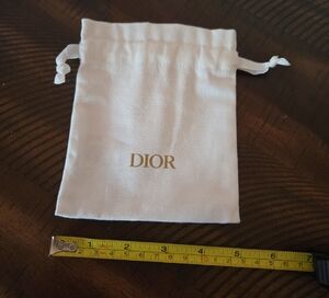 Dior Gold Logo White Pouch